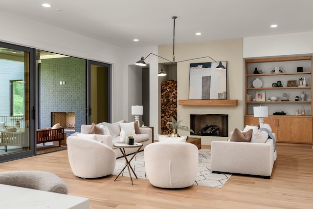 6120 Bresslyn Rd, Nashville, TN 37205 - living room with a fireplace, light wood-style floors, and recessed lighting