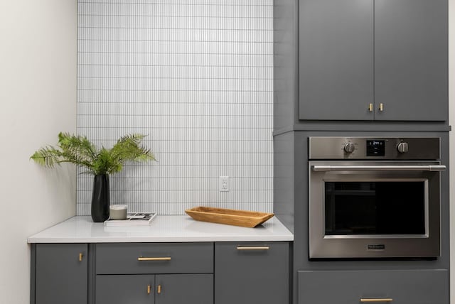 6120 Bresslyn Rd, Nashville, TN 37205 - kitchen featuring stainless steel oven, gray cabinets, and light countertops