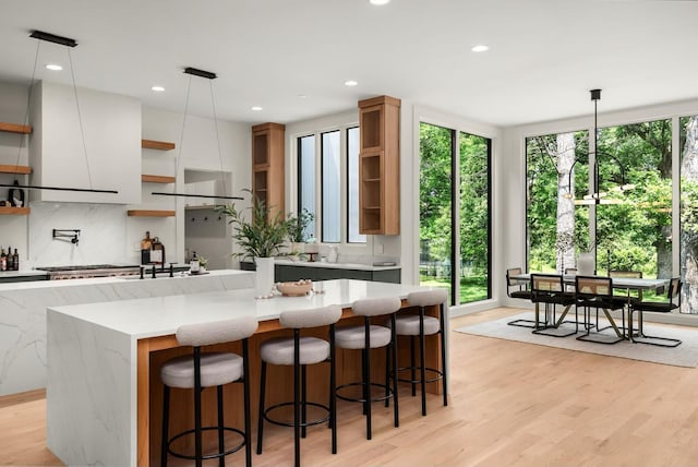 6120 Bresslyn Rd, Nashville, TN 37205 - kitchen featuring open shelves, decorative backsplash, recessed lighting, pendant lighting, and a kitchen breakfast bar