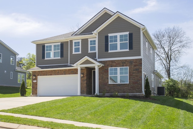 view of front facade with central air condition unit, a front lawn, concrete driveway, an attached garage, and stone siding