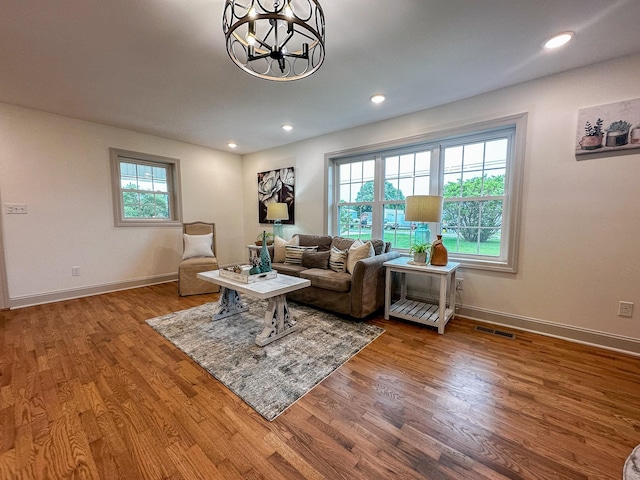 116 Smith Cir, Loretto, TN 38469 - living area featuring wood finished floors, a chandelier, baseboards, and recessed lighting
