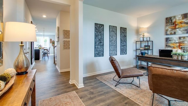 office area with dark wood-type flooring, recessed lighting, and baseboards