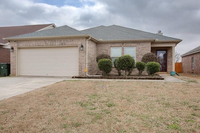 ranch-style house featuring a front yard, a garage, brick siding, concrete driveway, and a shingled roof