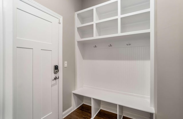 mudroom with dark wood-type flooring