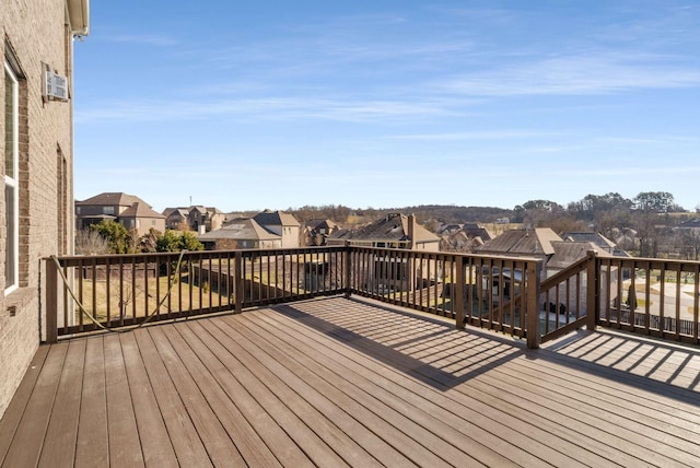 wooden deck featuring a residential view
