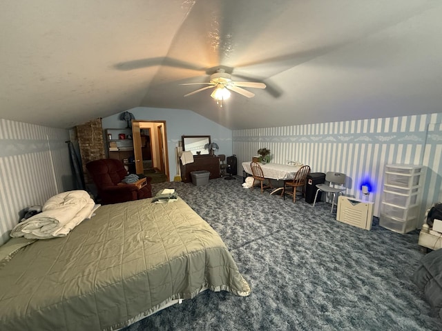 carpeted bedroom featuring ceiling fan and vaulted ceiling
