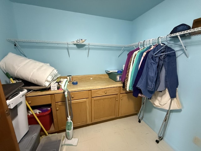 spacious closet featuring light floors