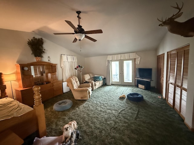 carpeted living area with a ceiling fan, french doors, and lofted ceiling