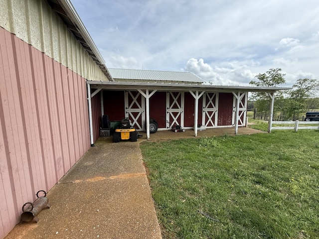 exterior space featuring an outbuilding and an exterior structure