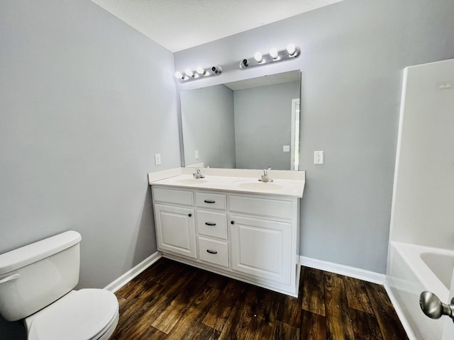 436 White Rd, Leoma, TN 38468 - full bath featuring a sink, baseboards, toilet, and wood finished floors