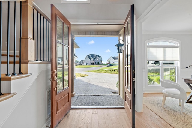 1209 Janie Sue Ct, Lebanon, TN 37087 - foyer with wood finished floors, french doors, baseboards, crown molding, and a residential view