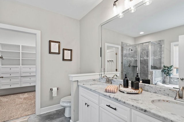 1209 Janie Sue Ct, Lebanon, TN 37087 - full bath with a shower stall, toilet, double vanity, baseboards, and a spacious closet