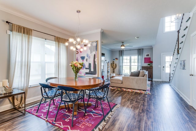 dining space featuring stairway, baseboards, crown molding, and wood finished floors
