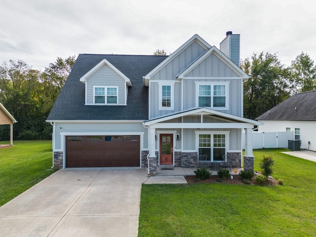 craftsman inspired home featuring board and batten siding, concrete driveway, a chimney, and stone siding