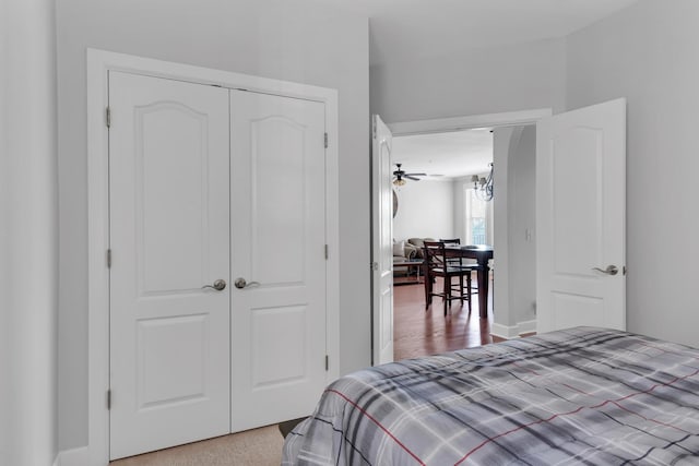 bedroom featuring a closet and wood finished floors