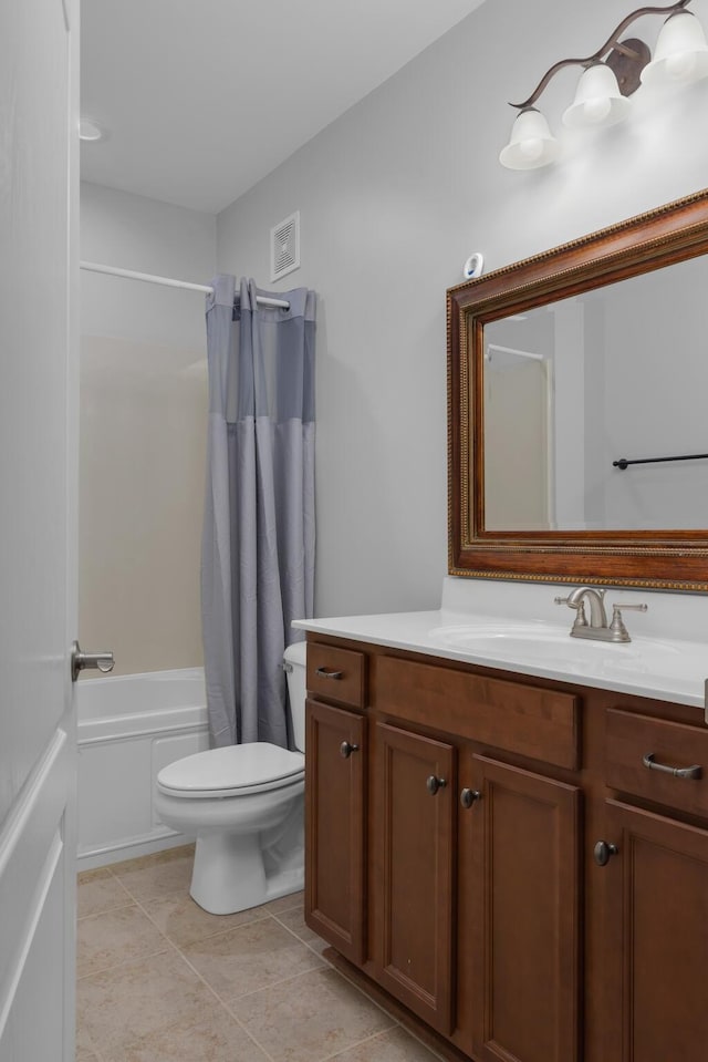 full bathroom featuring visible vents, tile patterned flooring, vanity, toilet, and shower / tub combo