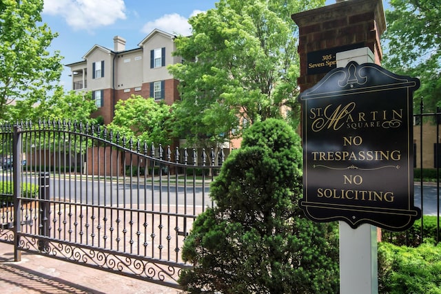 view of gate featuring fence