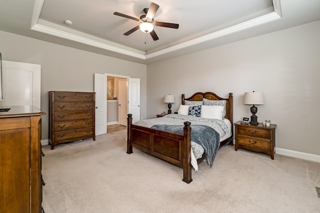 6006 Trotwood Ln, Spring Hill, TN 37174 - bedroom with a raised ceiling, baseboards, light carpet, and a ceiling fan