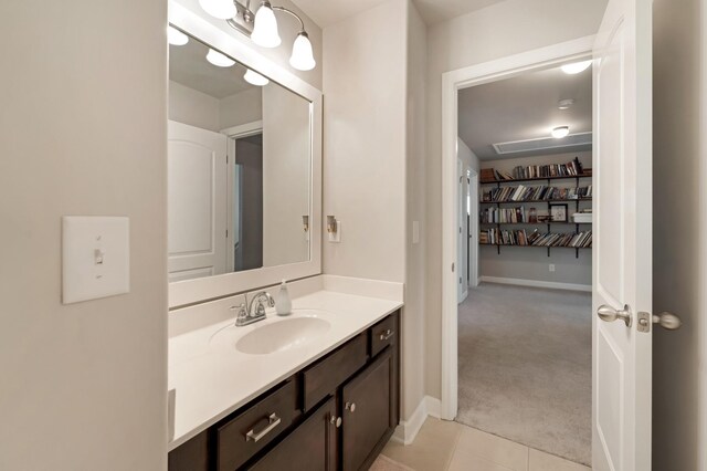 6006 Trotwood Ln, Spring Hill, TN 37174 - bathroom with vanity, baseboards, tile patterned floors, and a walk in closet