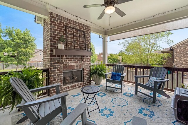 6006 Trotwood Ln, Spring Hill, TN 37174 - view of patio featuring ceiling fan, fence, and an outdoor brick fireplace