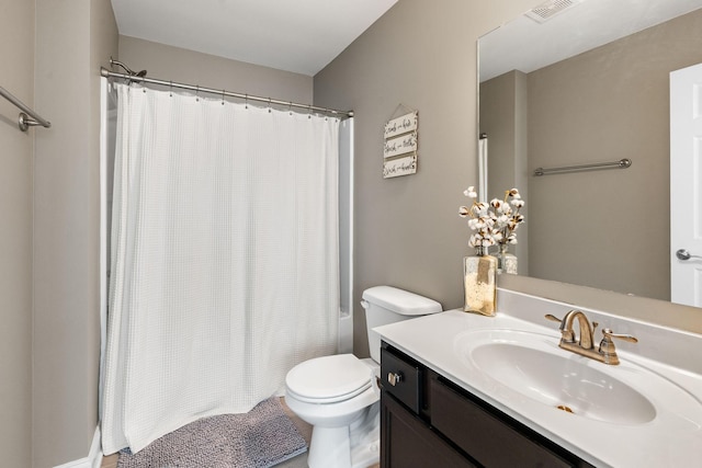 full bath featuring vanity, toilet, and visible vents