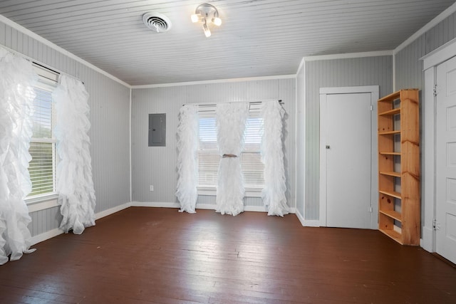 unfurnished room featuring crown molding, wood-type flooring, and plenty of natural light
