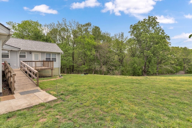 view of yard featuring a deck
