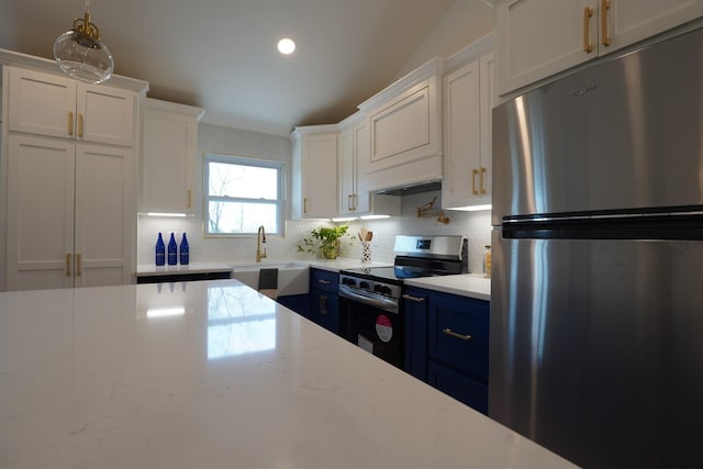 kitchen featuring decorative backsplash, blue cabinetry, a sink, stainless steel appliances, and white cabinetry