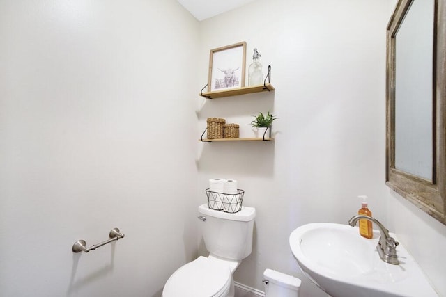 1121 Walnut Grove Church Rd, Dayton, TN 37321 - bathroom featuring a sink, baseboards, and toilet