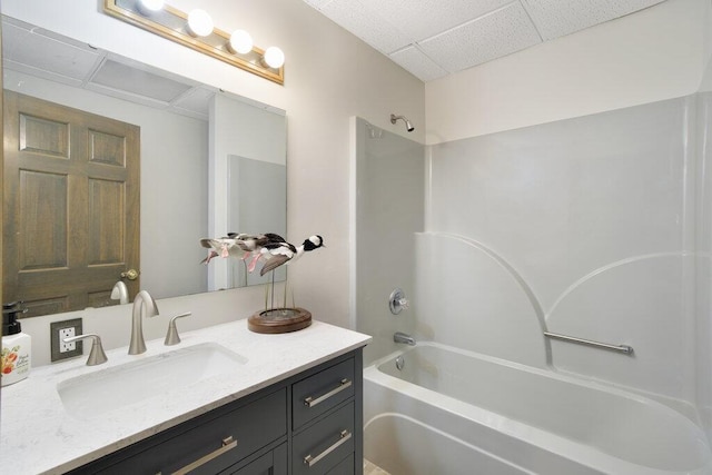 1121 Walnut Grove Church Rd, Dayton, TN 37321 - full bathroom featuring vanity, washtub / shower combination, and a drop ceiling
