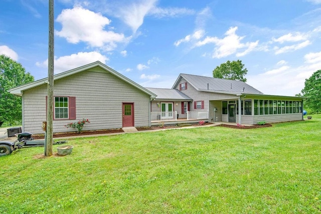 1121 Walnut Grove Church Rd, Dayton, TN 37321 - view of front of house with a sunroom, french doors, and a front yard