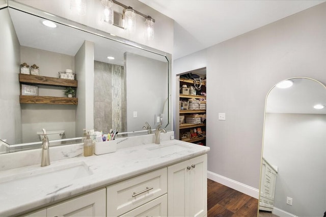 1121 Walnut Grove Church Rd, Dayton, TN 37321 - full bath featuring baseboards, a sink, wood finished floors, and toilet