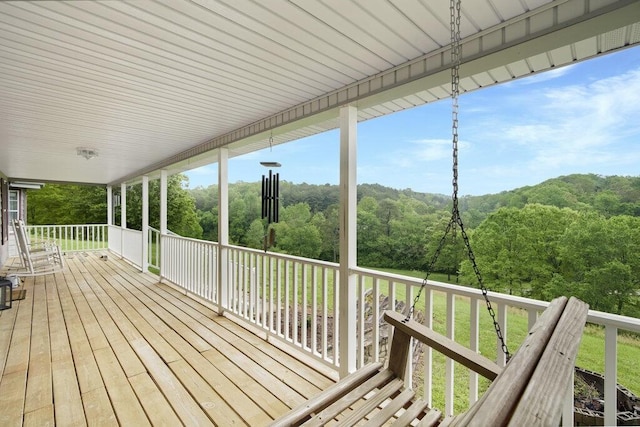 1121 Walnut Grove Church Rd, Dayton, TN 37321 - wooden deck with a wooded view
