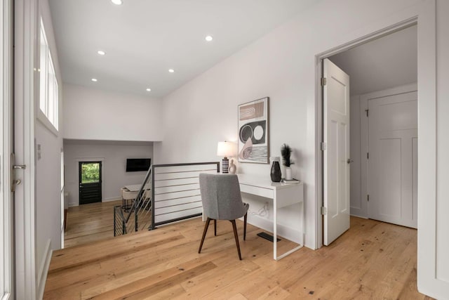 office featuring recessed lighting, baseboards, and light wood finished floors