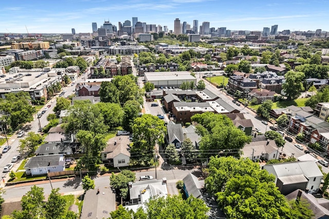 birds eye view of property with a view of city