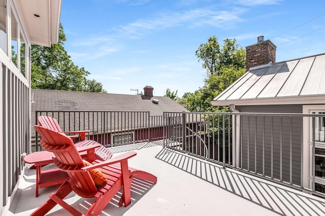 view of patio with a balcony