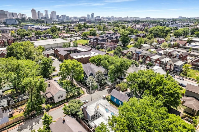 birds eye view of property featuring a city view