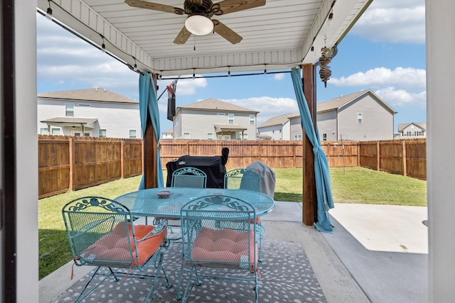 4326 Bomeadows Dr, Murfreesboro, TN 37128 - view of patio featuring a fenced backyard, outdoor dining area, ceiling fan, and a residential view