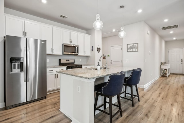 4326 Bomeadows Dr, Murfreesboro, TN 37128 - kitchen featuring a sink, appliances with stainless steel finishes, light wood finished floors, and visible vents