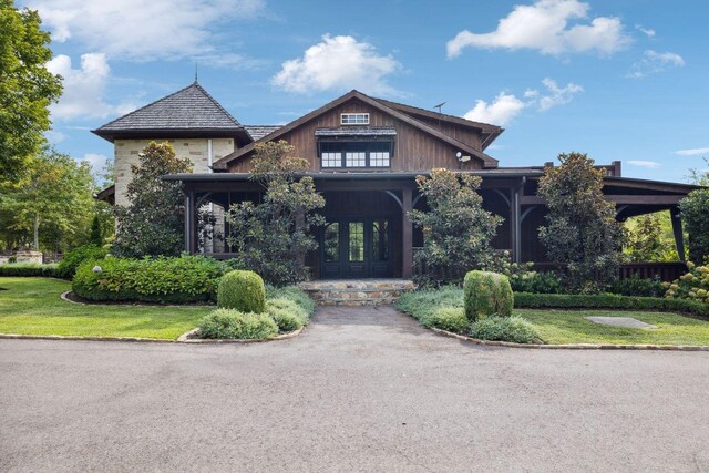 5715 Greenbrier Rd, Franklin, TN 37064 - view of front of home with french doors and a front yard