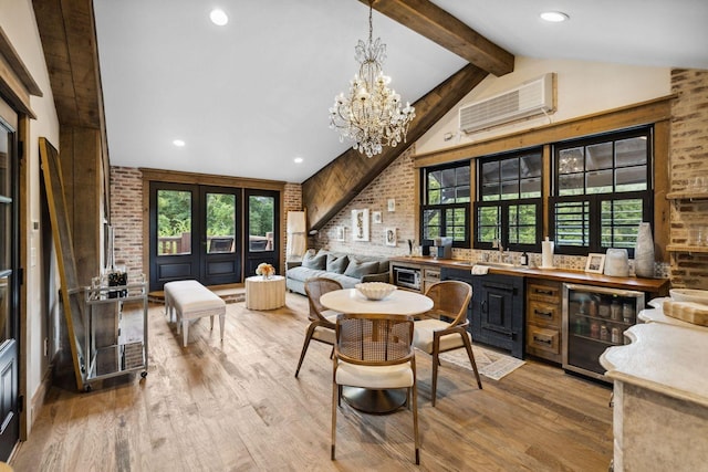 5715 Greenbrier Rd, Franklin, TN 37064 - dining space featuring wood finished floors, brick wall, beam ceiling, beverage cooler, and an AC wall unit