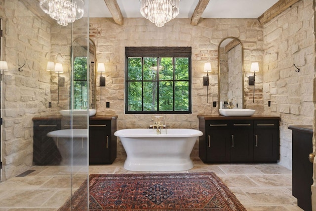 5715 Greenbrier Rd, Franklin, TN 37064 - full bath featuring an inviting chandelier, vanity, beamed ceiling, and stone tile floors