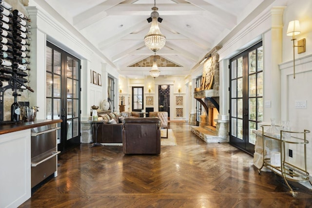 5715 Greenbrier Rd, Franklin, TN 37064 - living area featuring beamed ceiling, plenty of natural light, french doors, and a fireplace