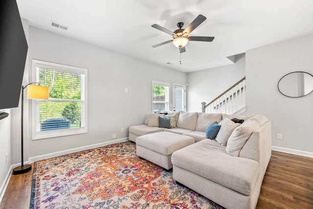 175 Harvard Dr, Gallatin, TN 37066 - living area featuring visible vents, stairs, wood finished floors, baseboards, and ceiling fan