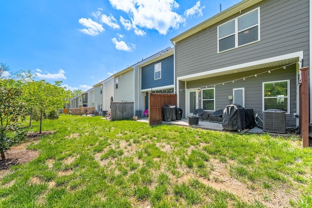 175 Harvard Dr, Gallatin, TN 37066 - rear view of house with a patio, a lawn, central AC, and fence