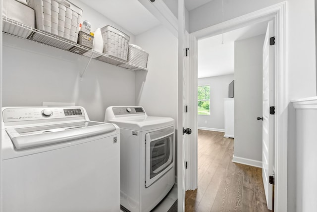 175 Harvard Dr, Gallatin, TN 37066 - laundry area with laundry area, attic access, dark wood-style flooring, baseboards, and washer and dryer