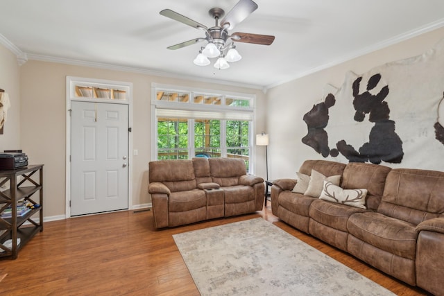 1005 Lauren Cir, Burns, TN 37029 - living area featuring baseboards, ornamental molding, a ceiling fan, and wood finished floors