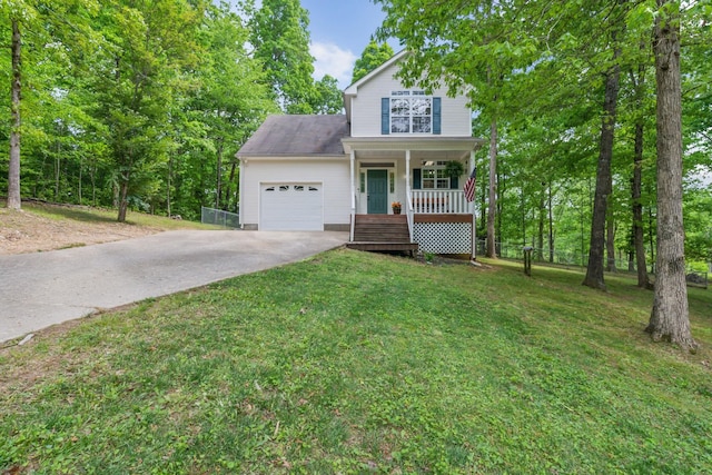 1005 Lauren Cir, Burns, TN 37029 - traditional-style house with an attached garage, covered porch, a front yard, and concrete driveway