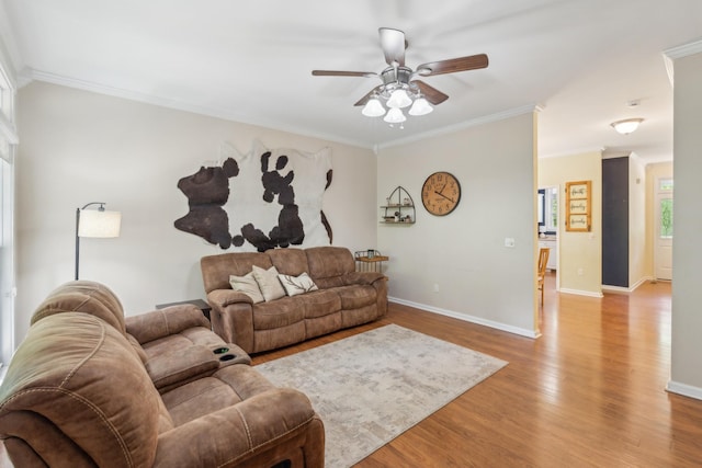 1005 Lauren Cir, Burns, TN 37029 - living room with baseboards, ornamental molding, ceiling fan, and wood finished floors