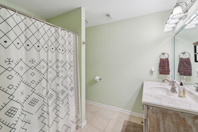 1005 Lauren Cir, Burns, TN 37029 - full bathroom featuring vanity, tile patterned floors, a shower with shower curtain, baseboards, and visible vents